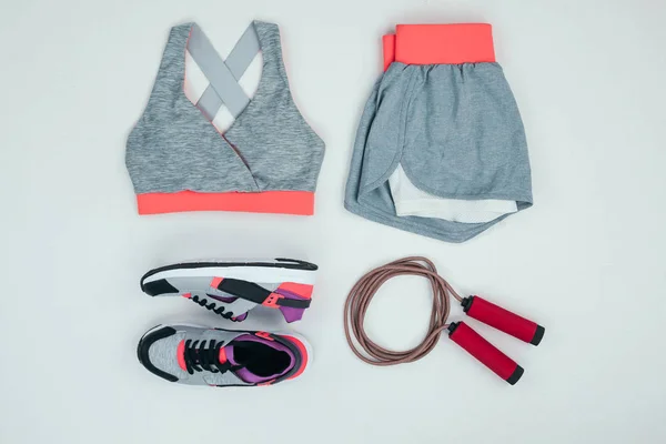 depositphotos_160185116-stock-photo-sportswear-and-fitness-equipment